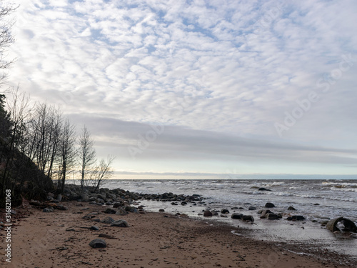 beautiful seascape  dark clouds and white waves