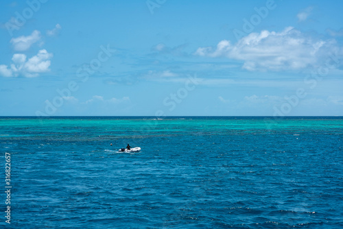 Turquoise ocean at Great Barrier Reef Outside of Cairns, Queensland Australia. © Sebastian