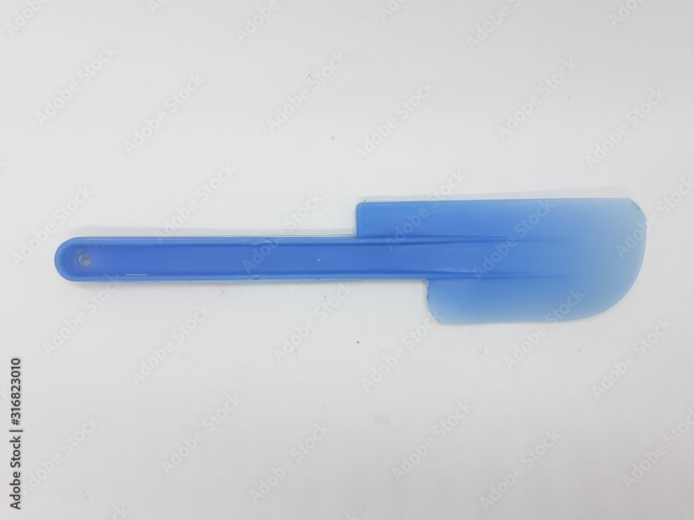 Beautiful Colorful Plastic Rubber Spoon Spatula in White Isolation Background Beautiful Colorful Plastic Rubber Spoon Spatula in White Isolation Background
