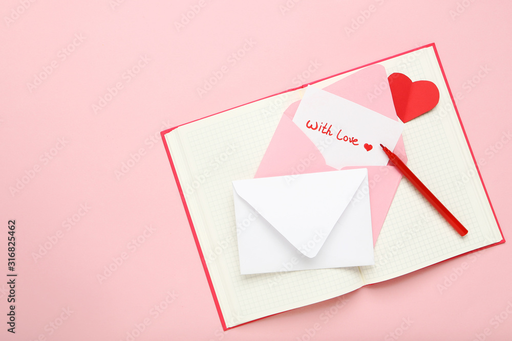 Paper envelopes with red heart, notepad and text With Love on pink background Paper envelopes with red heart, notepad and text With Love on pink background