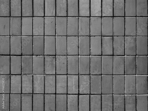 Tiled wall in black and white, background