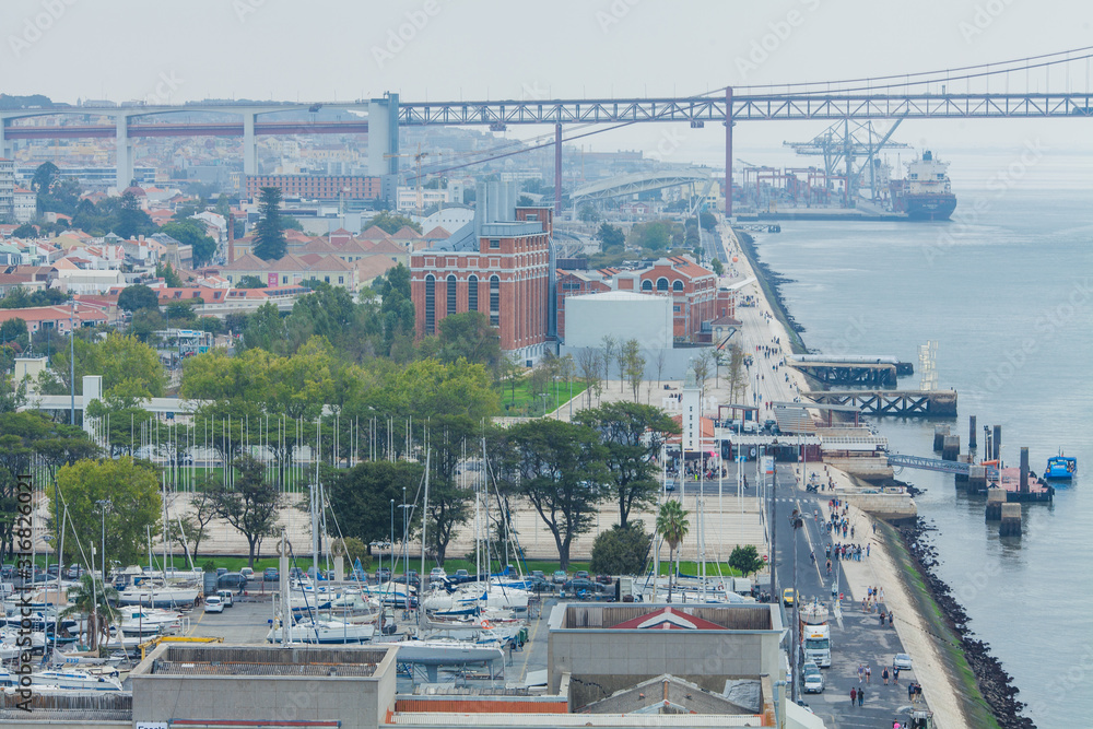 view from the aqueduct on the bridge and statue of the Christ in Lisbon