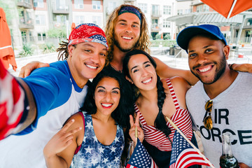 Air Force Veteran and friends having a 4th of July BBQ party at apartment complex. 