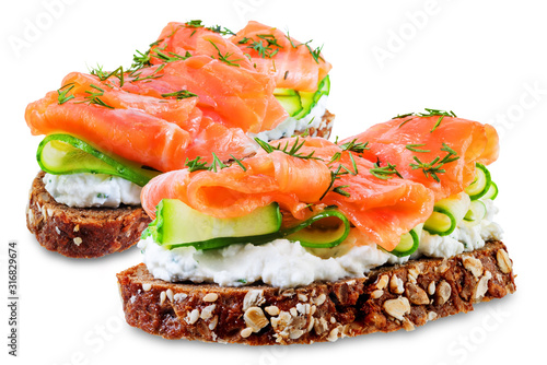 Wallpaper Mural Smoked salmon ricotta cheese  rye sandwich on a white isolated background