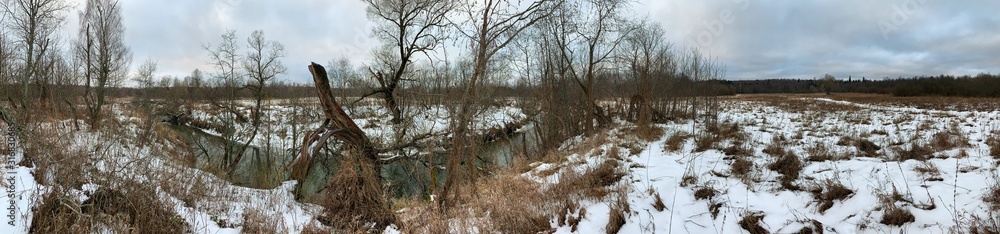 Panoramic view with winter river and snow forest. Beautiful winter landscape Panoramic view with winter river and snow forest. Beautiful winter landscape