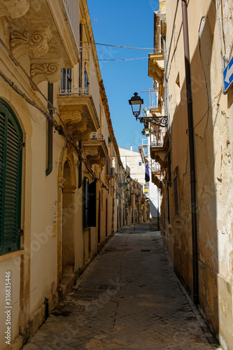 one of the charming  narrow street in Ortigia  oldest part of the beautiful baroque city of Syracuse in Sicily  Italy