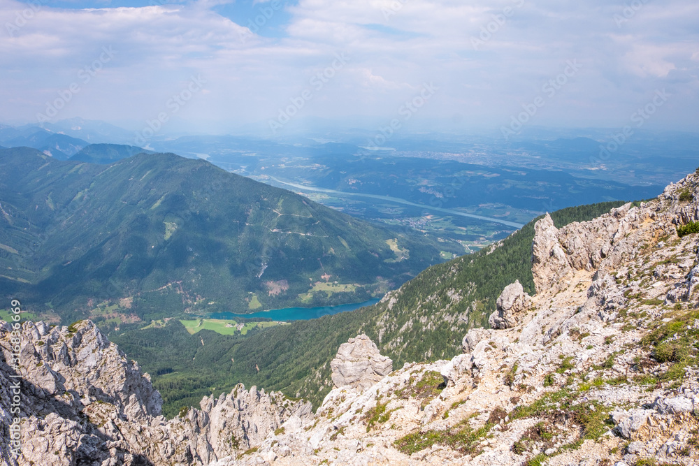 View from mountain Hochobir to valley Rosental, lake Freibach Stausee