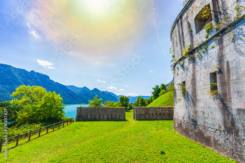 Sightseeing at the beautiful landscape of lake Idro Rocca d'Anfo Italy, ruins of a old bunker photo