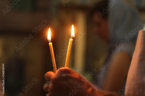 Valokuva orthodox church, baptism of a child, burning candles
