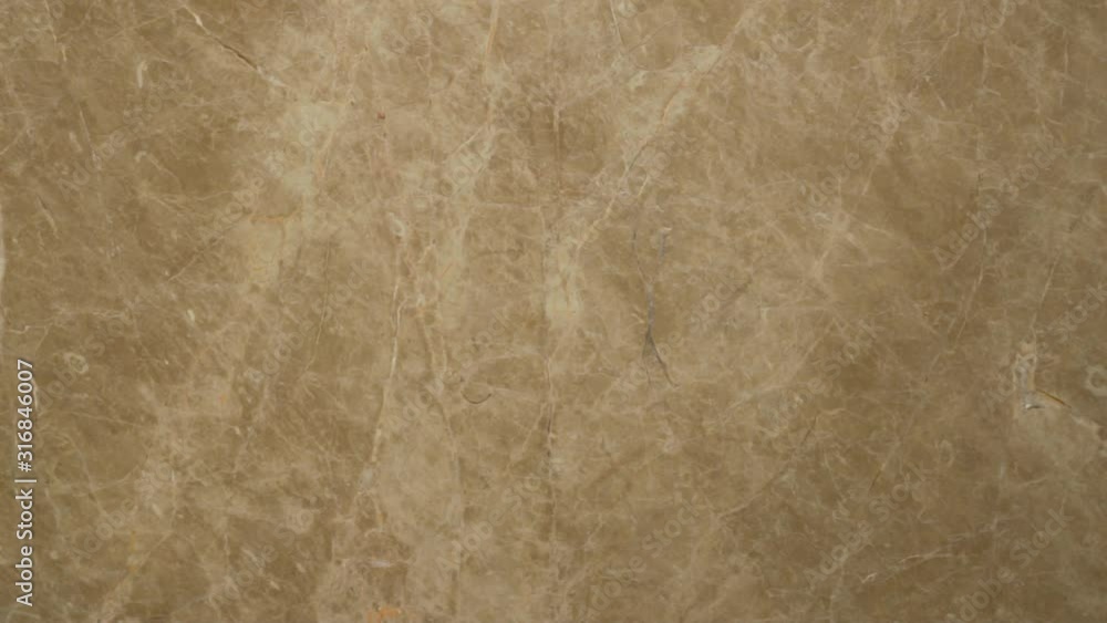Marble stone surface in beige tones from a single piece of marble in a modern interior for interior decoration of the house premises Marble stone surface in beige tones from a single piece of marble in a modern interior for interior decoration of the house premises