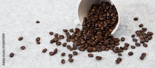 Good coffee beans in a caffe mug