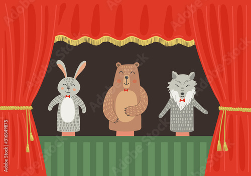 Puppet theatre. Forest animals: rabbit, wolf and bear on the scene with red curtain. 