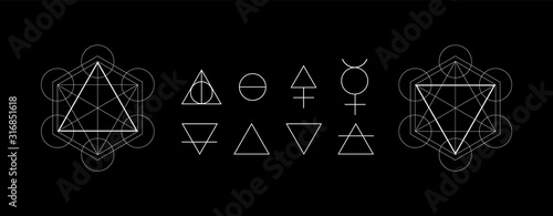 Photo Alchemy symbols isolated on dark background