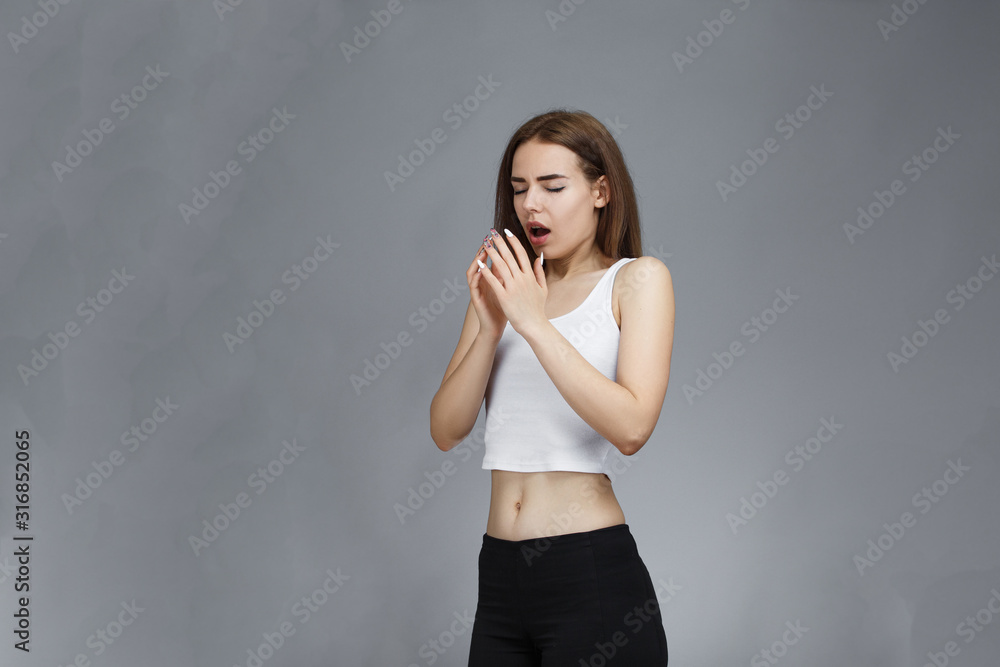 girl coughing standing in studio girl coughing standing in studio