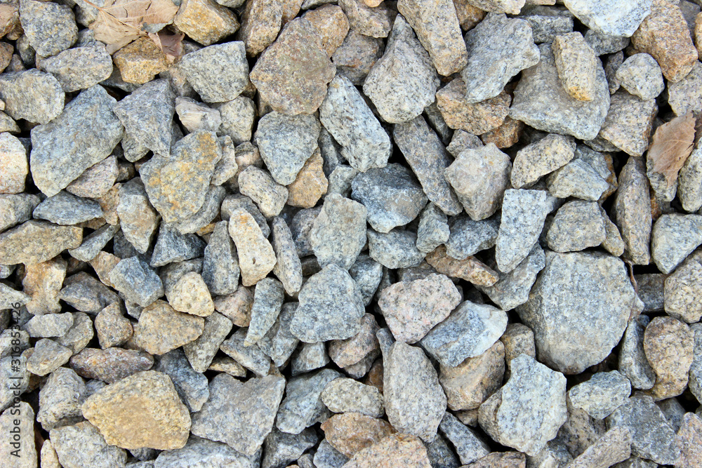 Scattered stones background. Cropped shot of stones texture. Abstract nature background. Scattered stones background. Cropped shot of stones texture. Abstract nature background.
