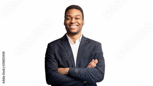 Portrait of happy black guy looking at camera