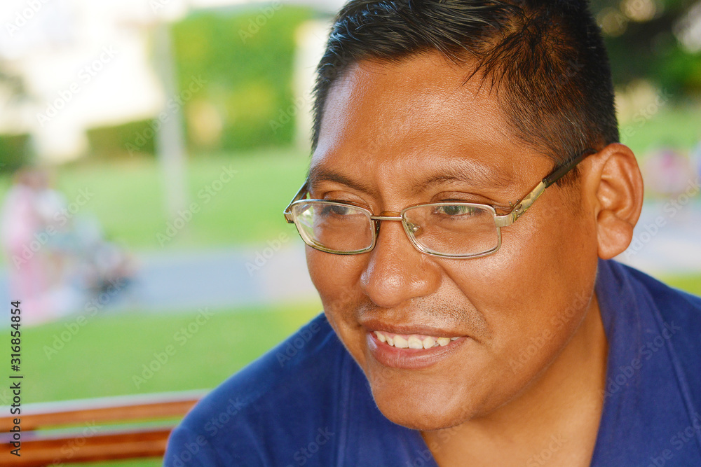 Happy native american man wearing glasses. Stock Photo Adobe Stock
