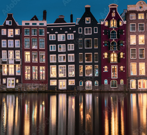 Buildings in Amsterdam Damrak at night