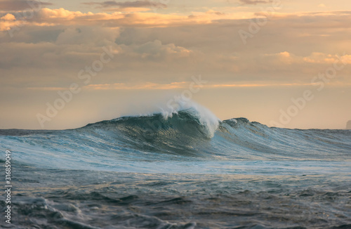 Crashing wave at sunset, Sydney Australia