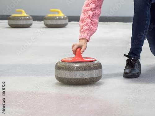 stone for curling on ice of a indoors rink