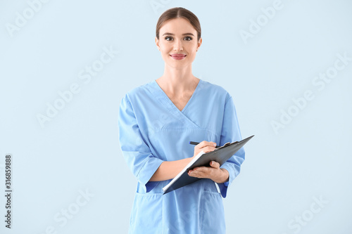 Portrait of female doctor w...