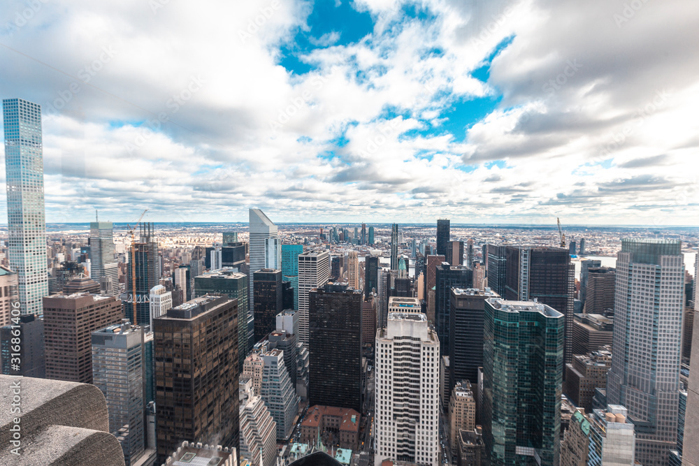 New York, United States »; January 5, 2020: Top of the Rock in New York, panoramic of the mix of Manhattan buildings