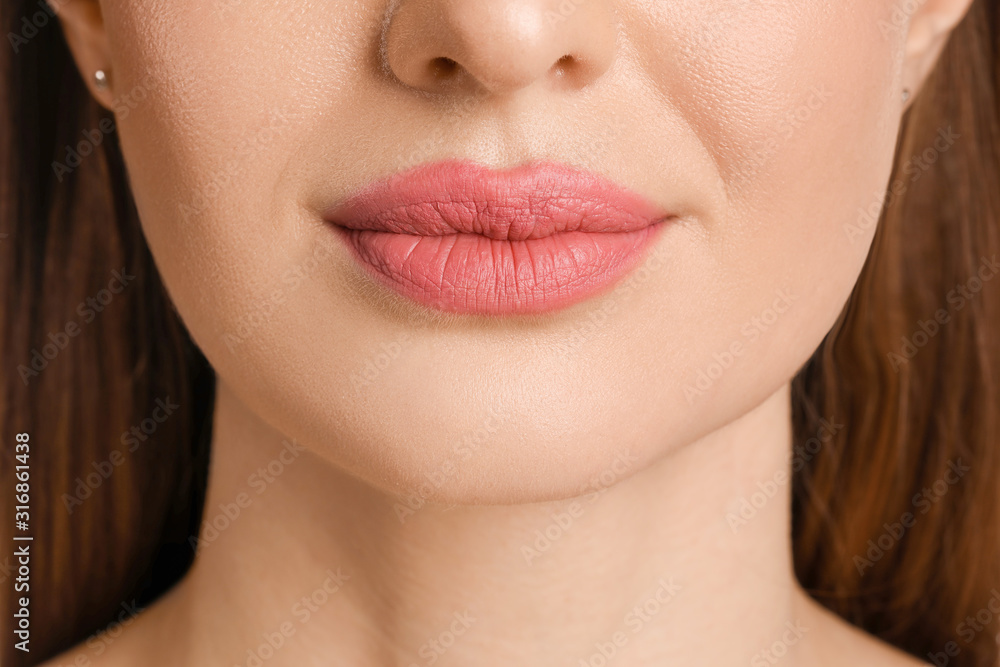 Beautiful young woman, closeup view Beautiful young woman, closeup view