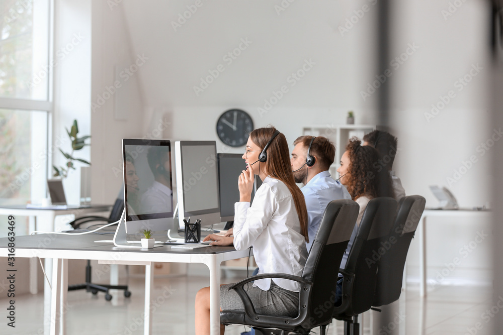 Technical support agents working in office Technical support agents working in office