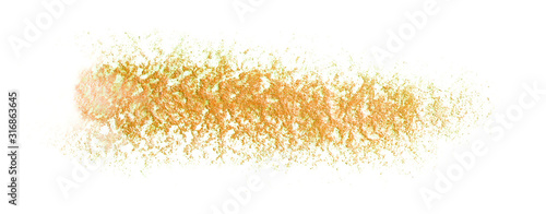 smear of dry makeup paint, on textured paper. yellow golden shiny.