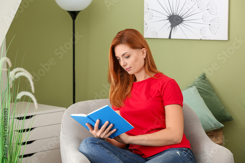 Beautiful woman reading boo...