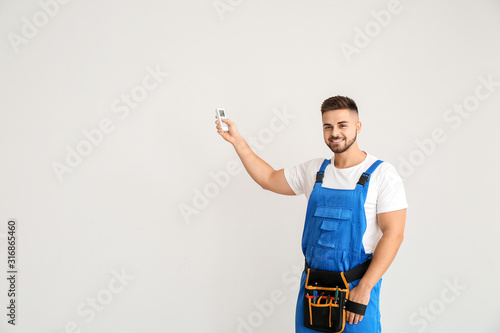 Male technician with air co...