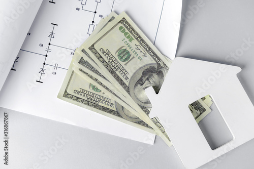 Figure of house with dollar...