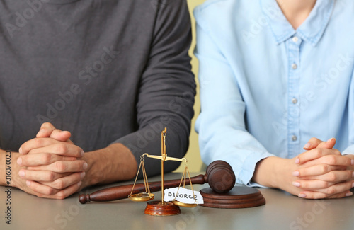 Couple visiting divorce lawyer in office photo