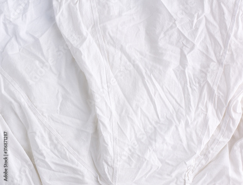 crumpled white cotton fabric, fabric for sewing clothes and shirts