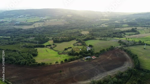 Green fields in Galicia,Spain. Aerial circling photo