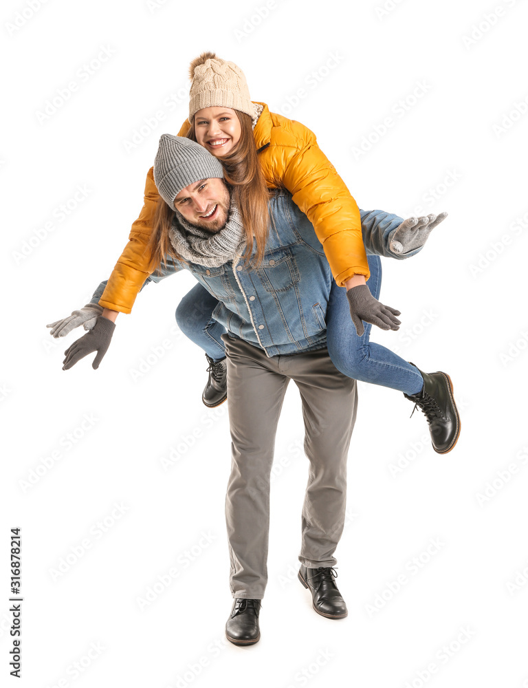 Portrait of happy couple in winter clothes on white background Portrait of happy couple in winter clothes on white background