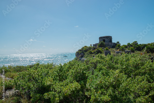 Tulum archaeological zone with over view of the sea at noon