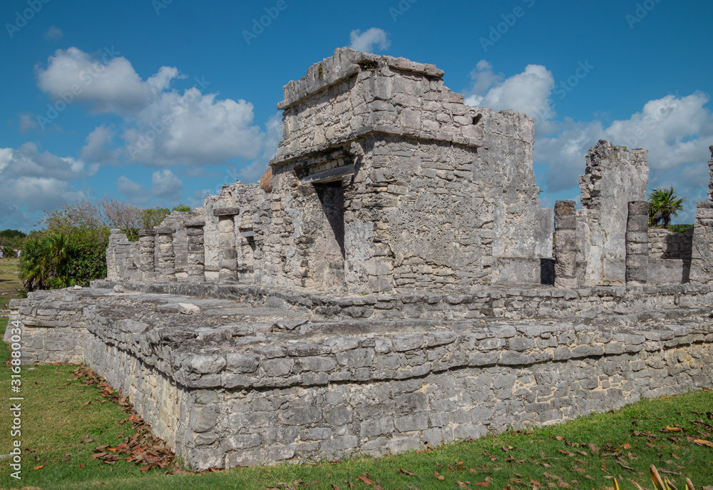 Tulum archaeological zone at noon in a sunny day