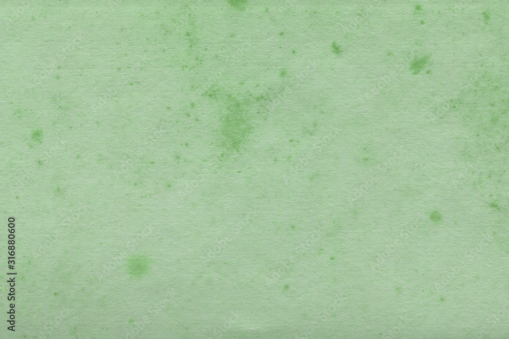 Obraz premium Cardboard green abstract pattern texture close-up. Retro old paper background. Grunge concrete wall. Vintage blank wallpaper.