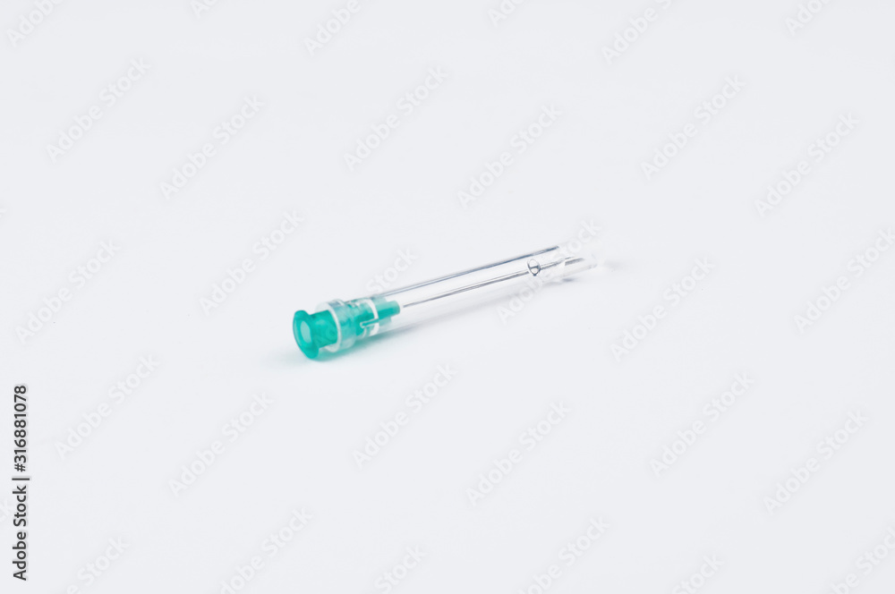 Syringe and needle isolated on white background.Copy space Syringe and needle isolated on white background.Copy space