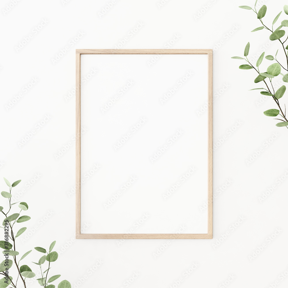 Fototapeta Interior poster mockup with vertical wooden frame on empty white wall, decorated with plant branches with green leaves. A4, A3 size format. 3D rendering, illustration.