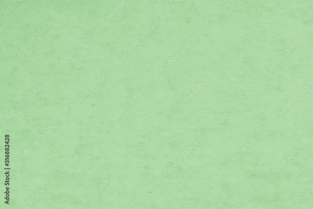 Cardboard green abstract pattern texture close-up. Retro old paper background. Grunge concrete wall. Vintage blank wallpaper. Cardboard green abstract pattern texture close-up. Retro old paper background. Grunge concrete wall. Vintage blank wallpaper.