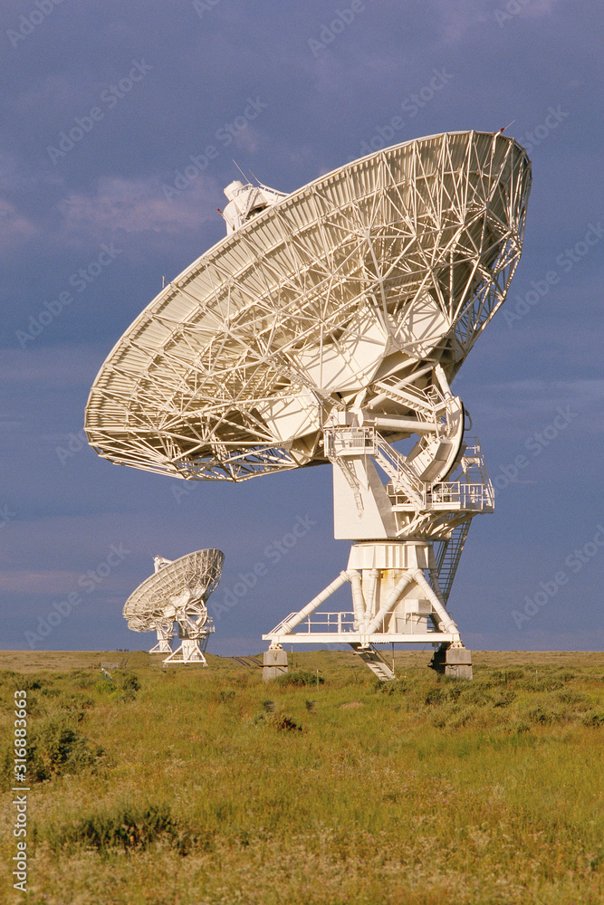 VLA Very Large Array radio telescope dish in field VLA Very Large Array radio telescope dish in field