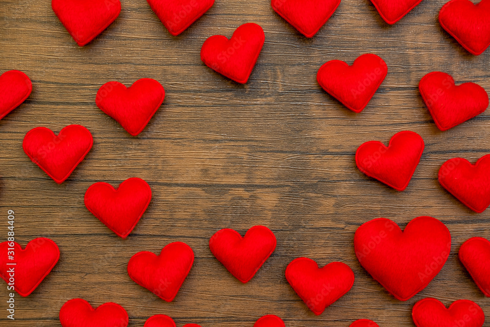 hearts composition. Frame made of red hearts, on wood background. Valentines day background. Flat lay, top view, copy space. hearts composition. Frame made of red hearts, on wood background. Valentines day background. Flat lay, top view, copy space.