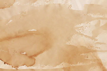 Vintage and old looking coffee cup stain background. Painted with a tea retro texture. Grunge paper for drawing. Ancient book page.