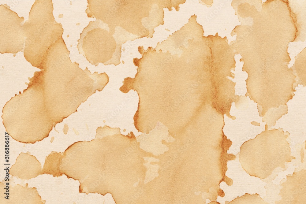 Fototapeta premium Vintage and old looking coffee cup stain background. Painted with a tea retro texture. Grunge paper for drawing. Ancient book page.