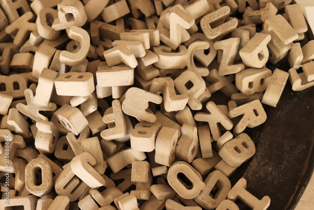 stone letters and numbers in a pile stone letters and numbers in a pile