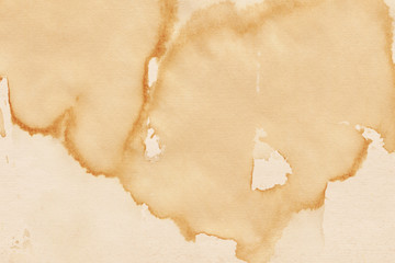 Vintage and old looking coffee cup stain background. Painted with a tea retro texture. Grunge paper for drawing. Ancient book page.
