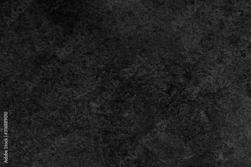 Dark grey black slate background or texture.