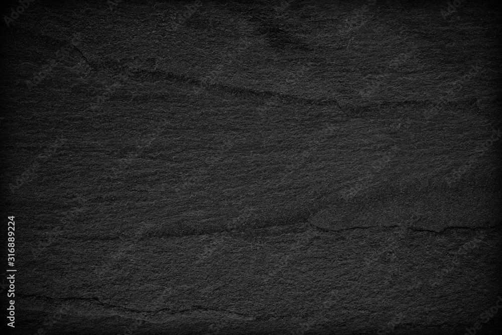 Fototapeta premium Dark grey black slate background or texture.